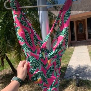 Deep cut one piece bathing suit